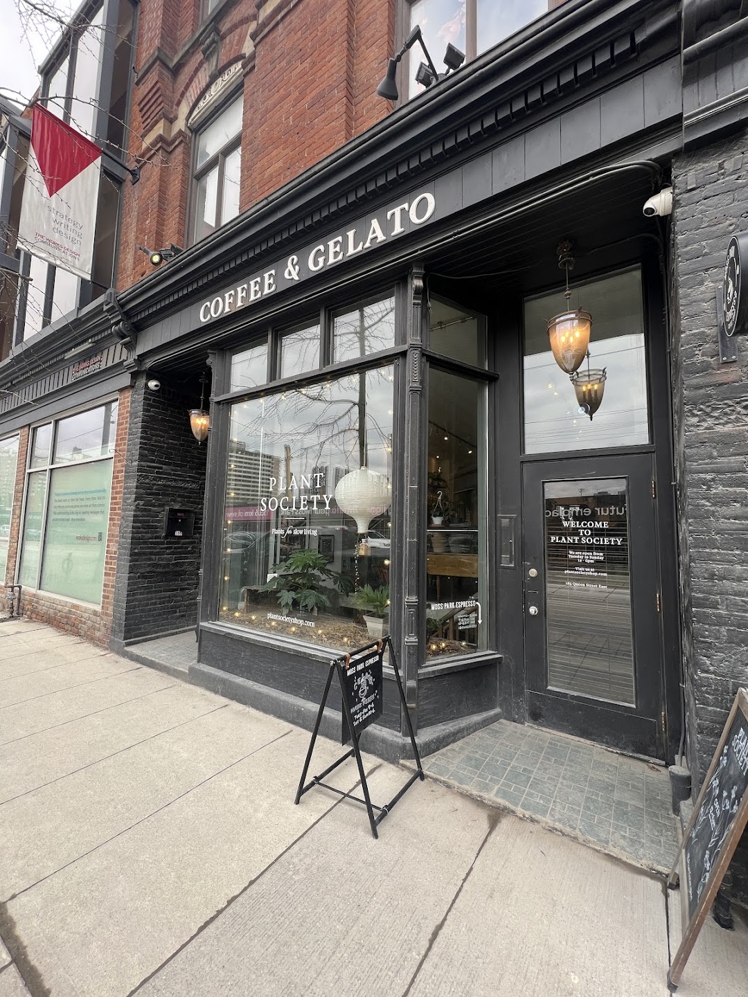 Wide view of Moss Park Espresso and Queen St East neighbourhood