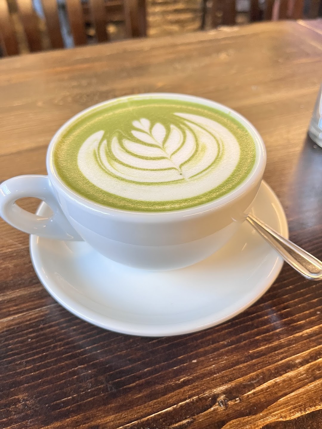 Matcha latte with art at Moss Park Espresso